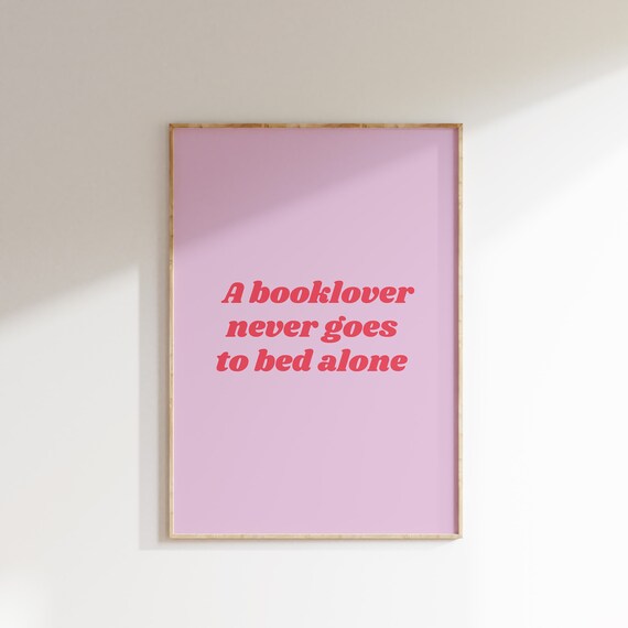 A Booklover Never Goes to Bed Alone Funny Reading Quote Pink Poster