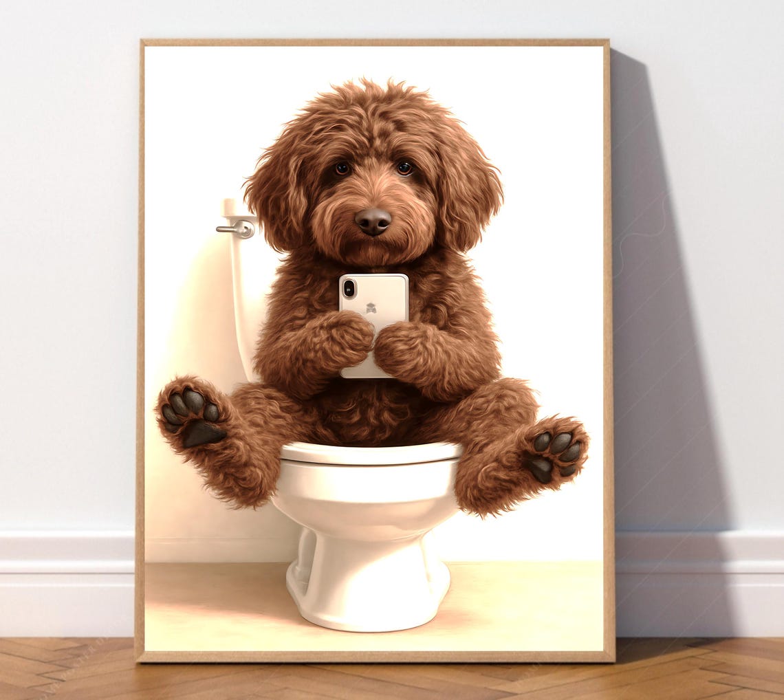 Fluffy Brown Cockapoo Puppy Sitting on a Toilet Holding a Phone Poster