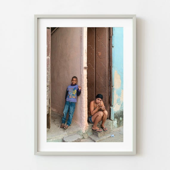 Boy And Woman Looking From Doorway Havana Wall Art