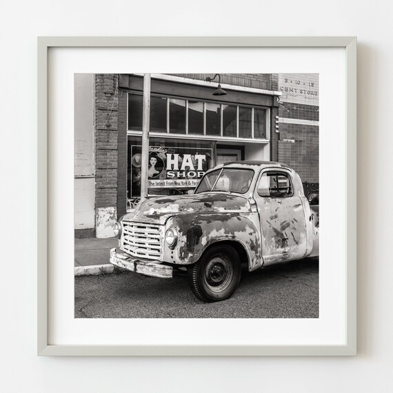 Weathered Old Pickup Truck Hat Shop Storefront Monochrome Poster