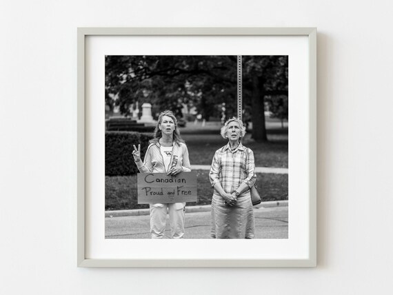 Two Women Holding Canadian Proud and Free Protest Sign Photo Poster