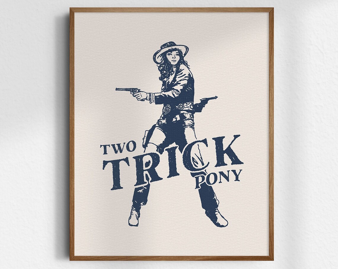 Two Trick Pony Cowgirl With Pistols Blue Western Retro Poster