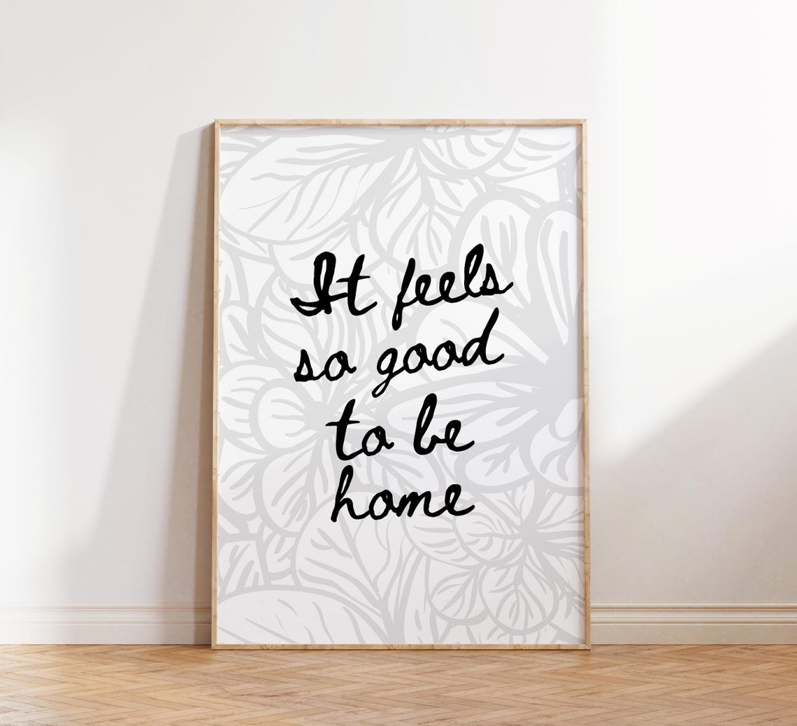 It Feels So Good To Be Home Flowing Black Script Quote Poster