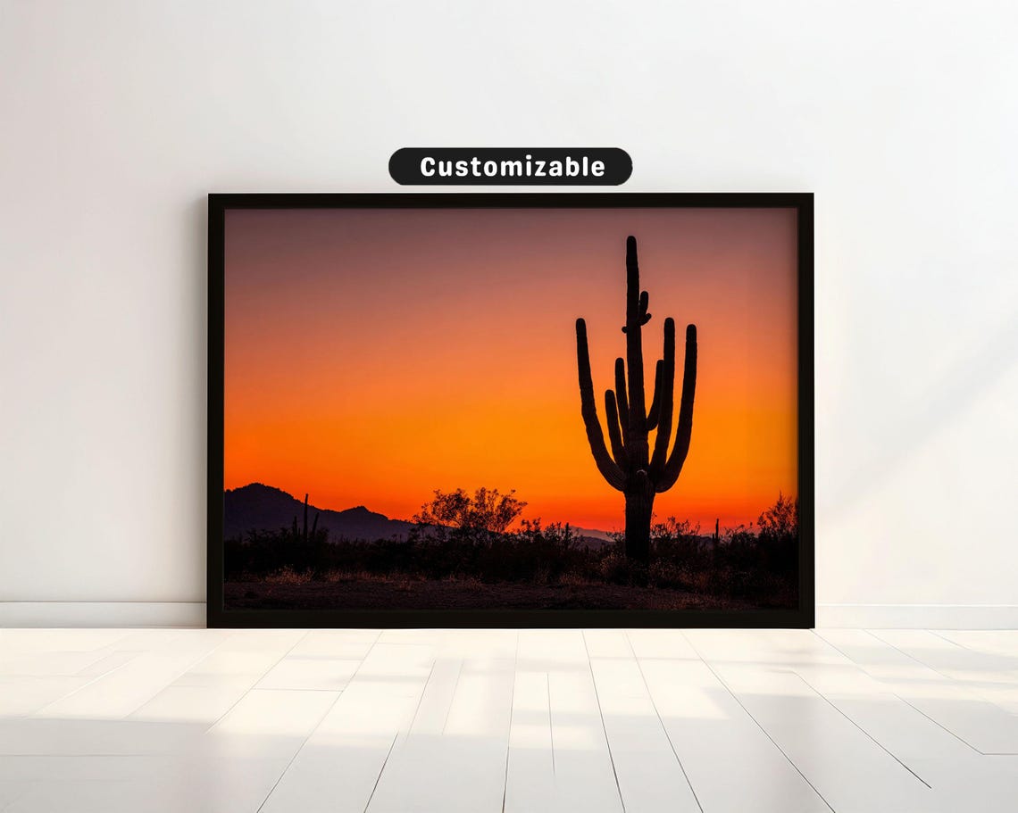 Saguaro Cactus Silhouette Under Vibrant Orange Sunset Travel Poster