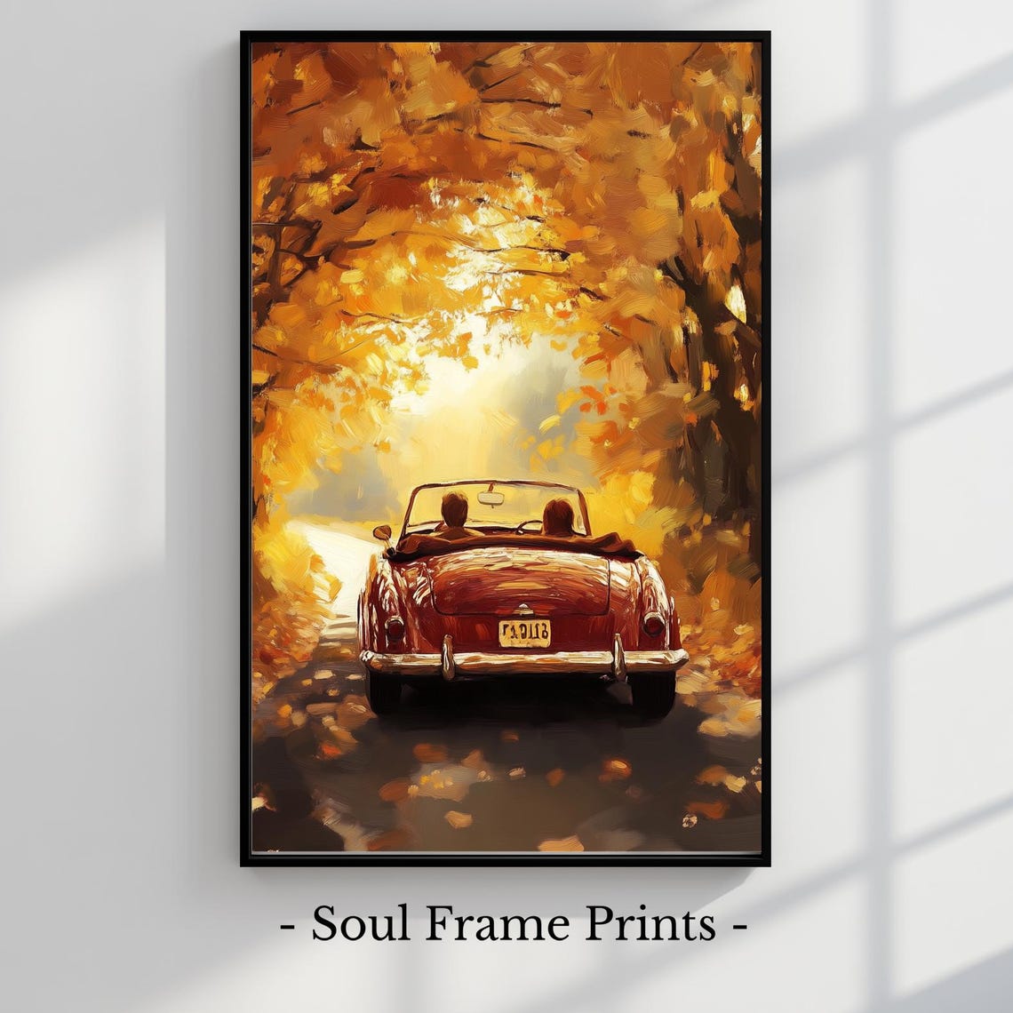 Classic Red Convertible Driving Down a Golden Autumn Road Poster