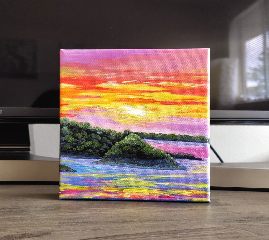 Pink Orange Sunset Sky Over Water With Green Island Rocks Art Poster - Image 3