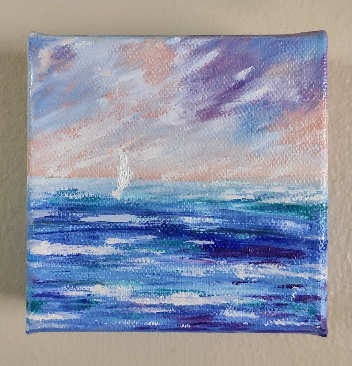 Tiny Sailboat Under Lavender Pink Dawn Sky On Blue Waves Art Poster - Image 4