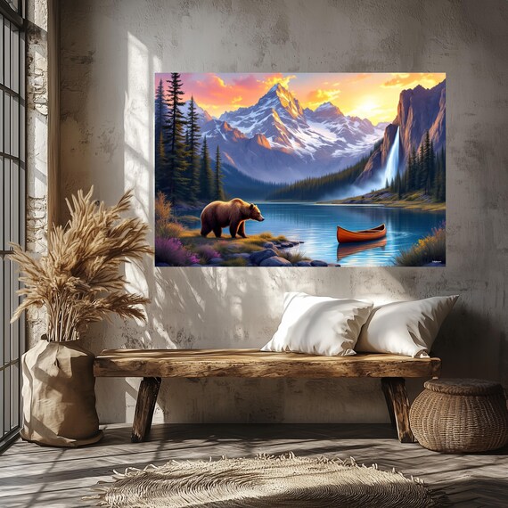 Brown Bear On A Lakeshore At Sunset With Canoe Waterfall And Peaks Poster