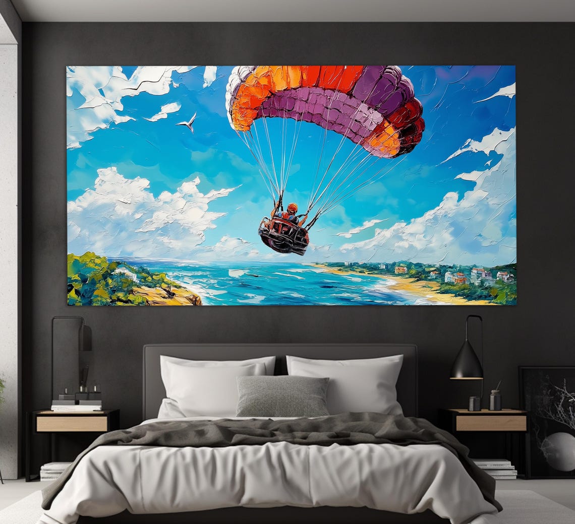 Colorful Paraglider Flying Over Coastal Beach Town Aerial View Poster