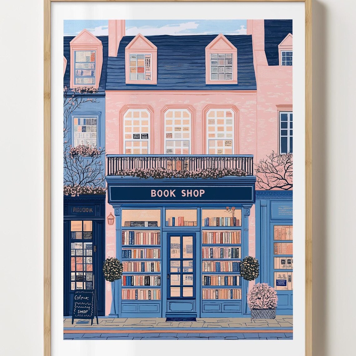 Navy Book Shop Storefront With Parisian Pink Building Above Poster