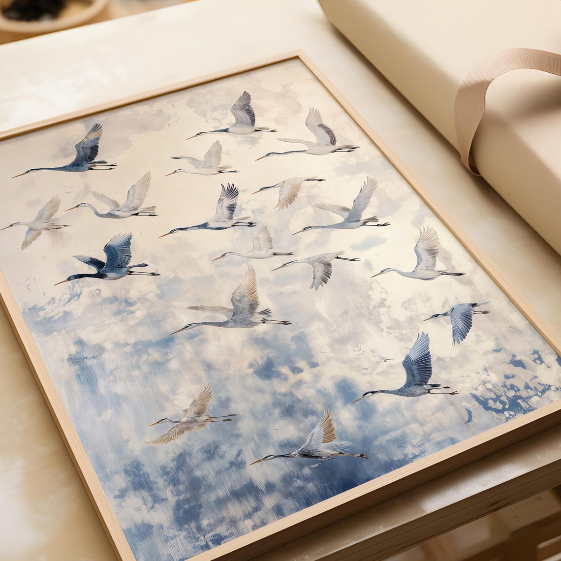 Flock of Herons in Flight Against a Soft Blue Cloudy Sky Wall Art - Image 4