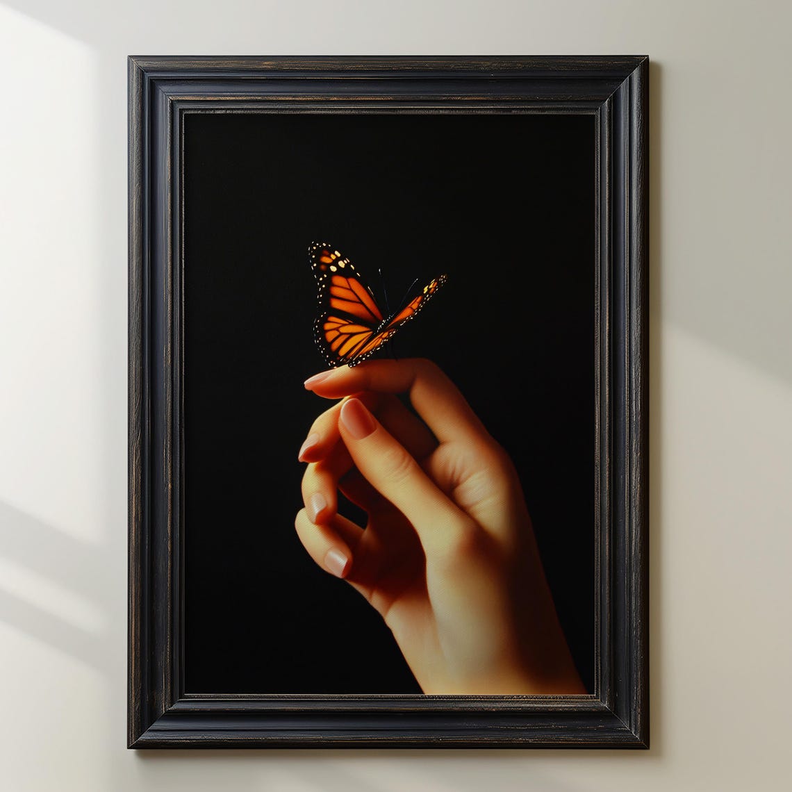 Monarch Butterfly Resting on a Hand on a Dark Background Poster - Image 2