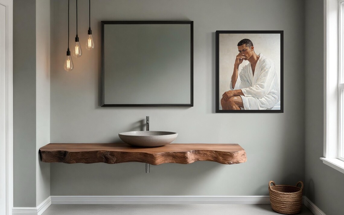 Young Man in White Robe Holding Nose in Funny Seated Pose Poster - Image 2