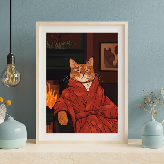 Cozy Ginger Cat in a Red Robe Relaxing by the Fireplace Poster