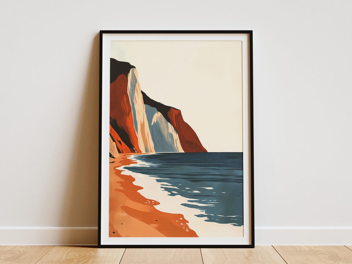Rust Orange Coastal Cliffs with Sandy Beach and Blue Sea Poster