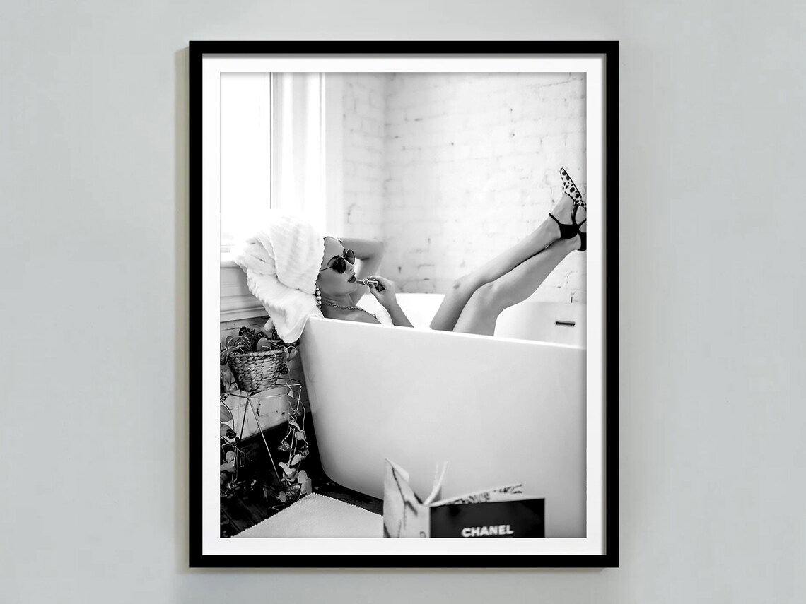 Woman Lounging in Bathtub With Chanel Bag Black and White Poster