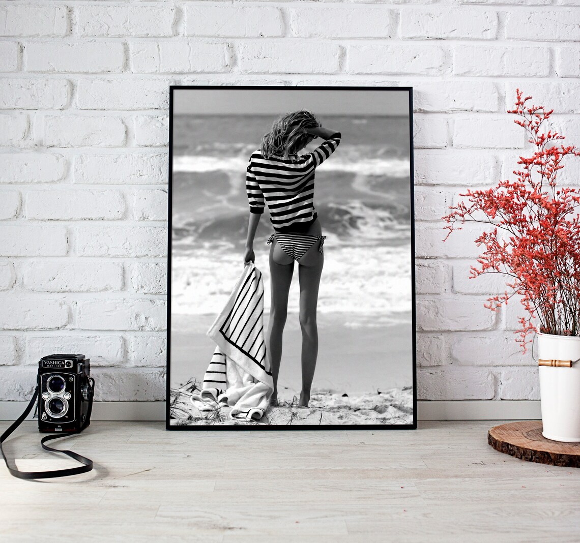 Woman in Striped Bikini Watching Ocean Waves Black and White Poster - Image 3