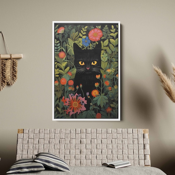 Black Cat With Golden Eyes Hiding Among Colorful Flowers Art Print