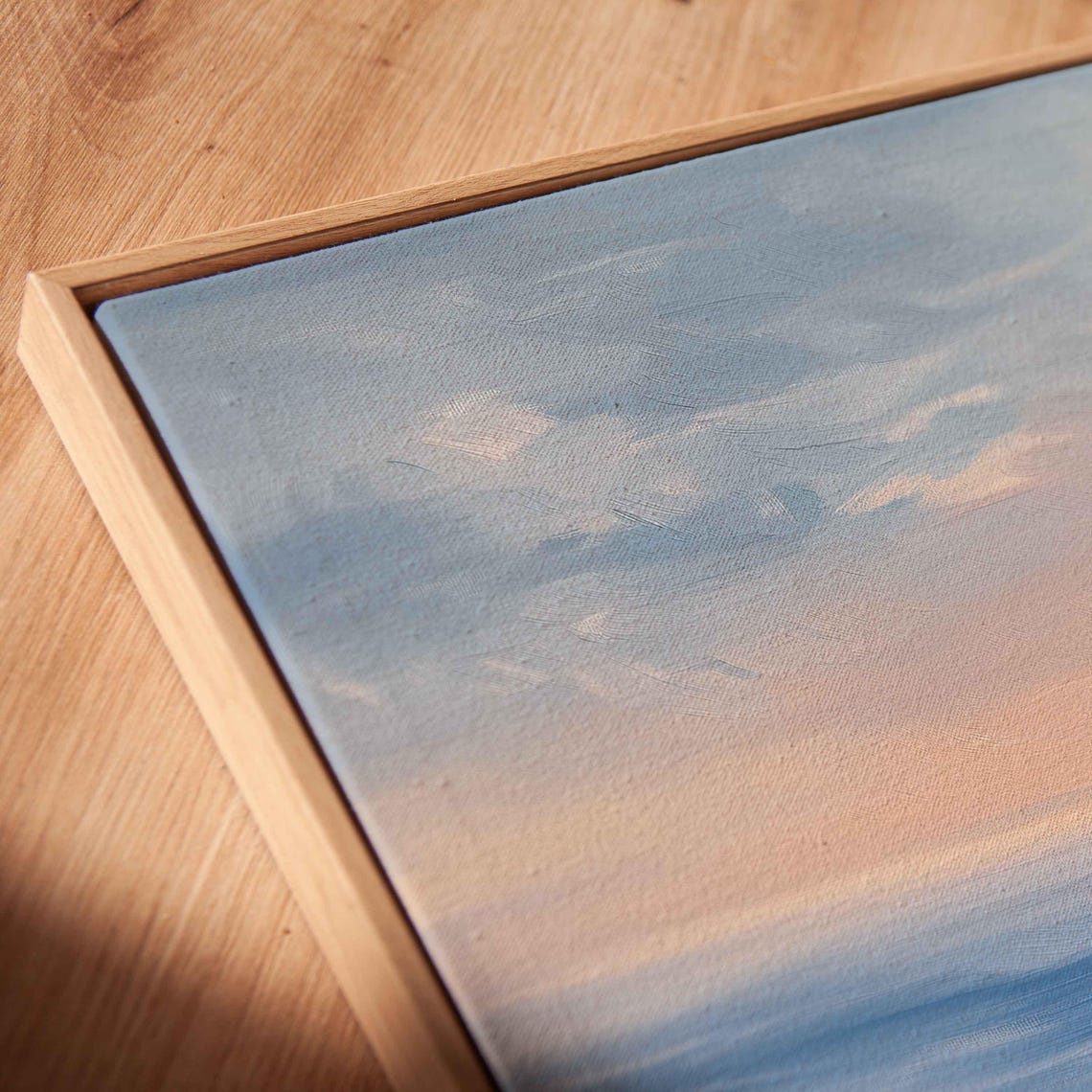 Surfer Paddling Across Serene Blue Ocean At Peach Sunrise Poster - Image 2