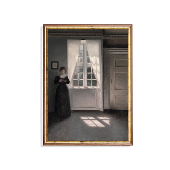 Woman Reading by a Tall Sunlit Window in a Moody Interior Poster