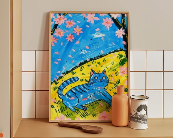 Bold Blue Cat Stretching Beneath Cherry Blossoms on a Sunny Hill Poster