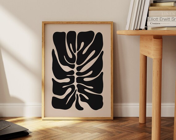 Bold Black Monstera Silhouette on Beige Abstract Botanical Poster
