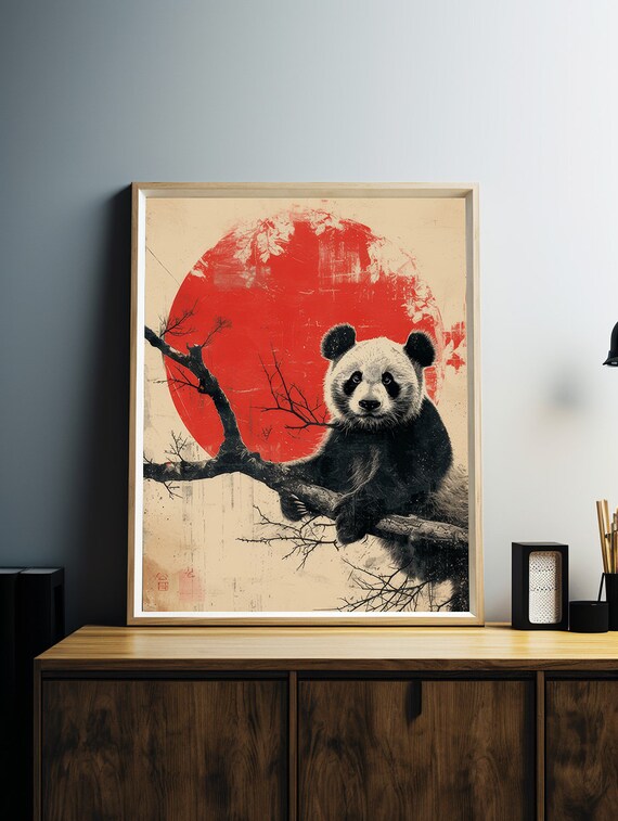 Panda Resting on a Tree Branch Beneath a Bold Red Sun Poster