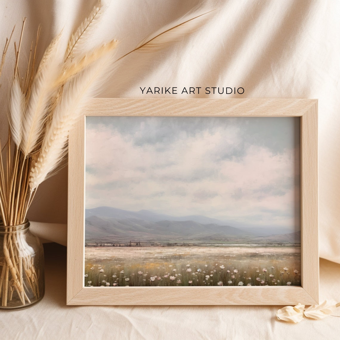 Serene Wildflower Field with Distant Mountains Under Cloudy Sky Poster - Image 2