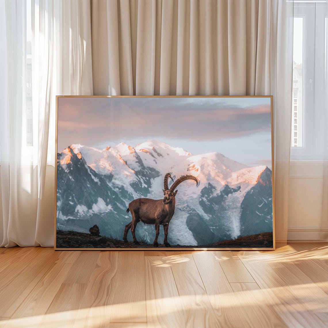 Alpine Ibex with Curved Horns Before Snowy Peaks at Sunrise Poster - Image 4