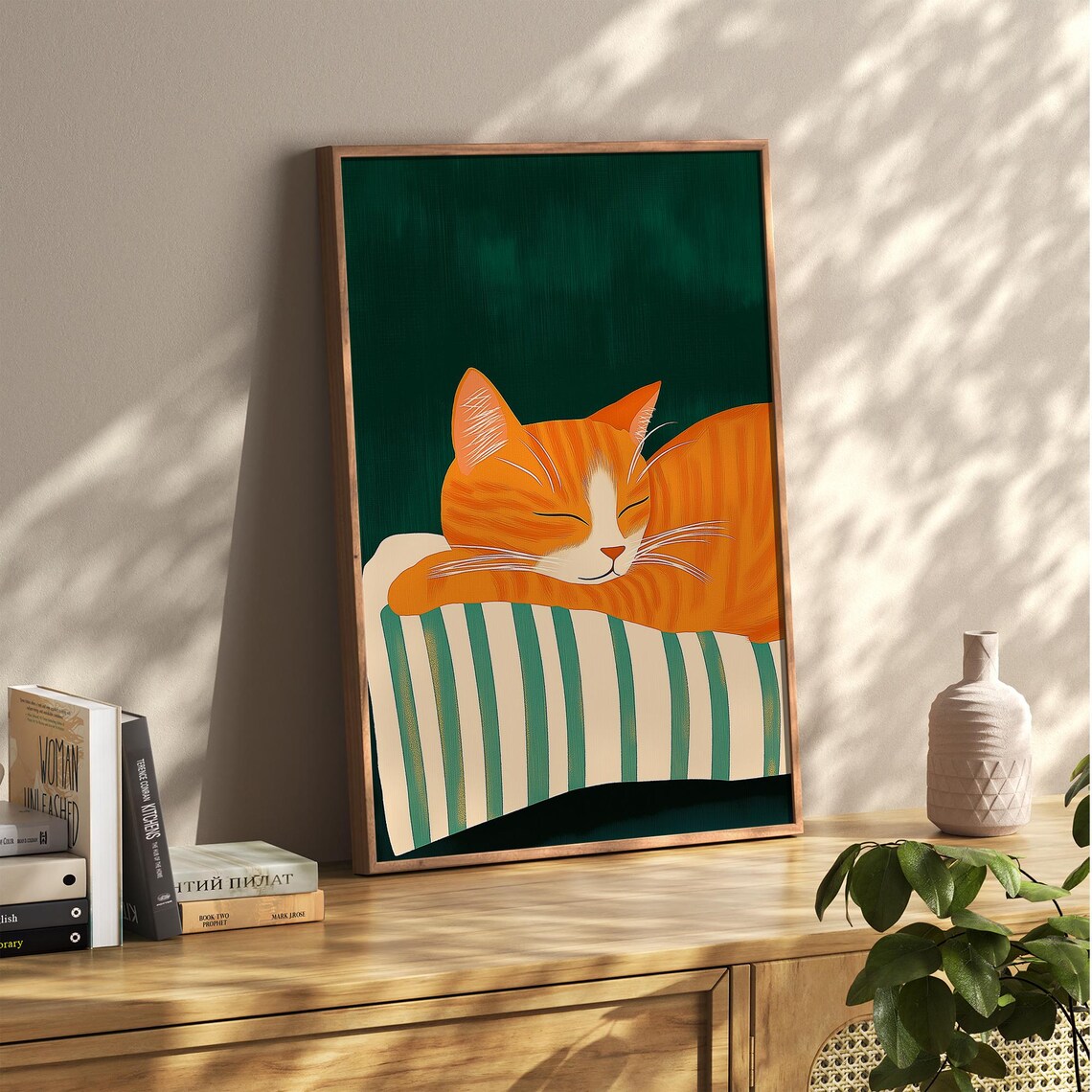 Orange Tabby Cat Sleeping on Striped Cushion Cozy Green Poster - Image 2