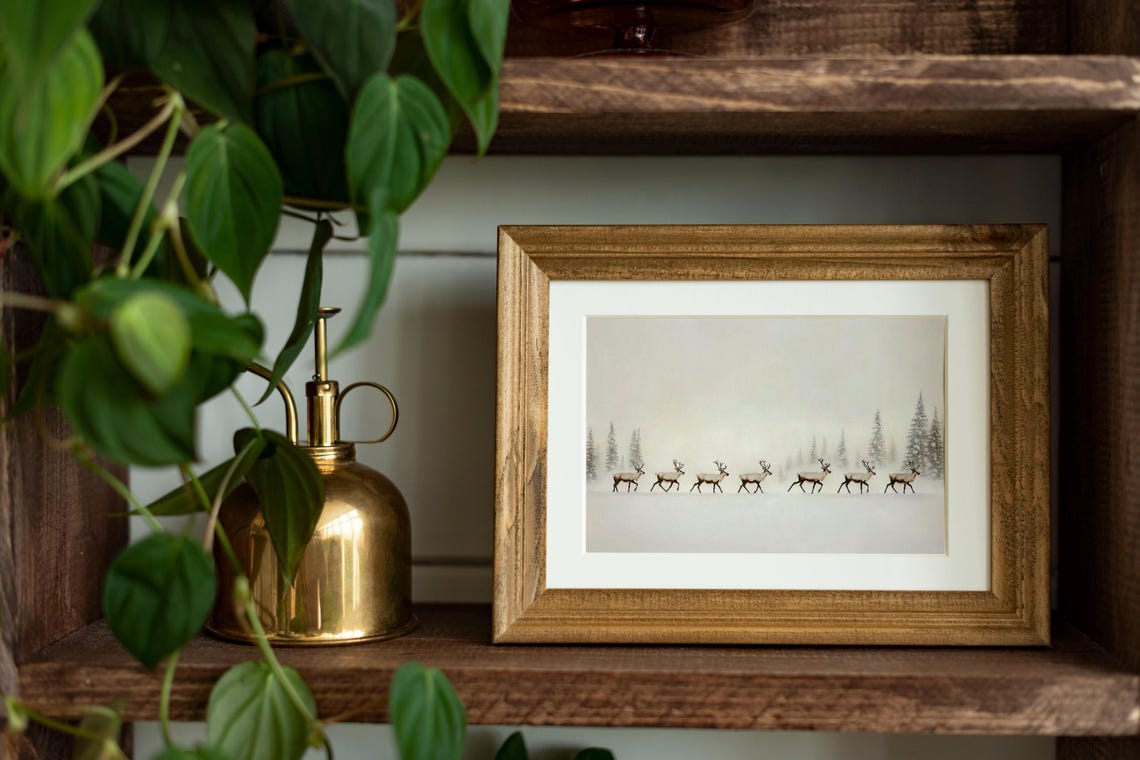 Seven Reindeer Walking Through Misty Snow Winter Landscape Poster - Image 2