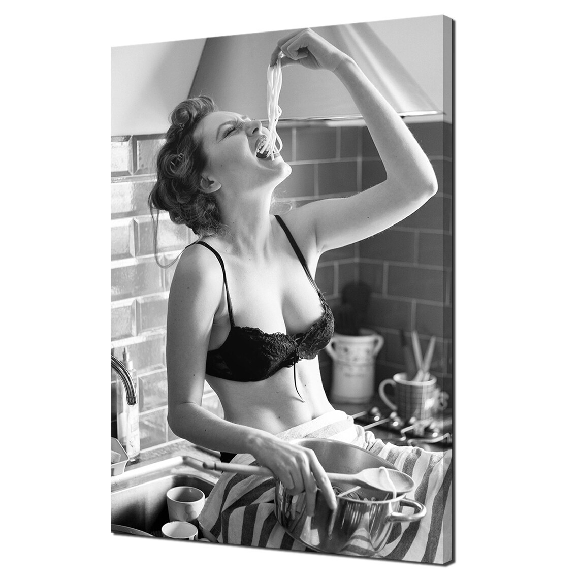 Black And White Playful Woman Eating Spaghetti In Kitchen Wall Art Print