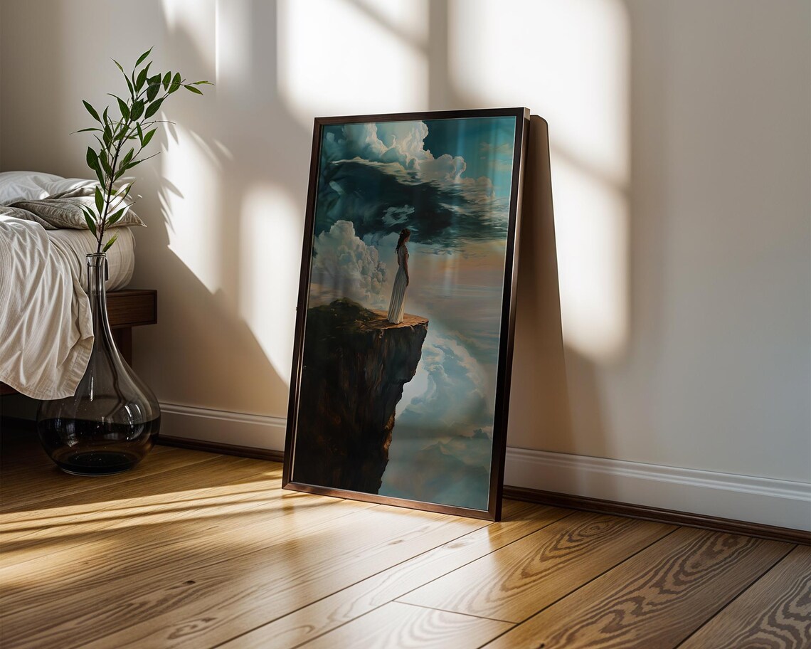 Woman in White Dress Standing on a Cliff Above a Sea of Clouds Poster - Image 4