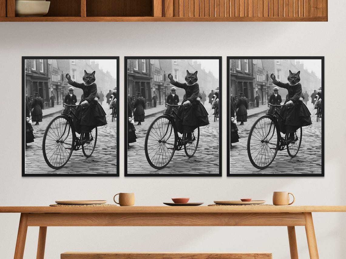 Victorian Cat Riding a Bicycle Down Cobblestone Street Sepia Poster - Image 2