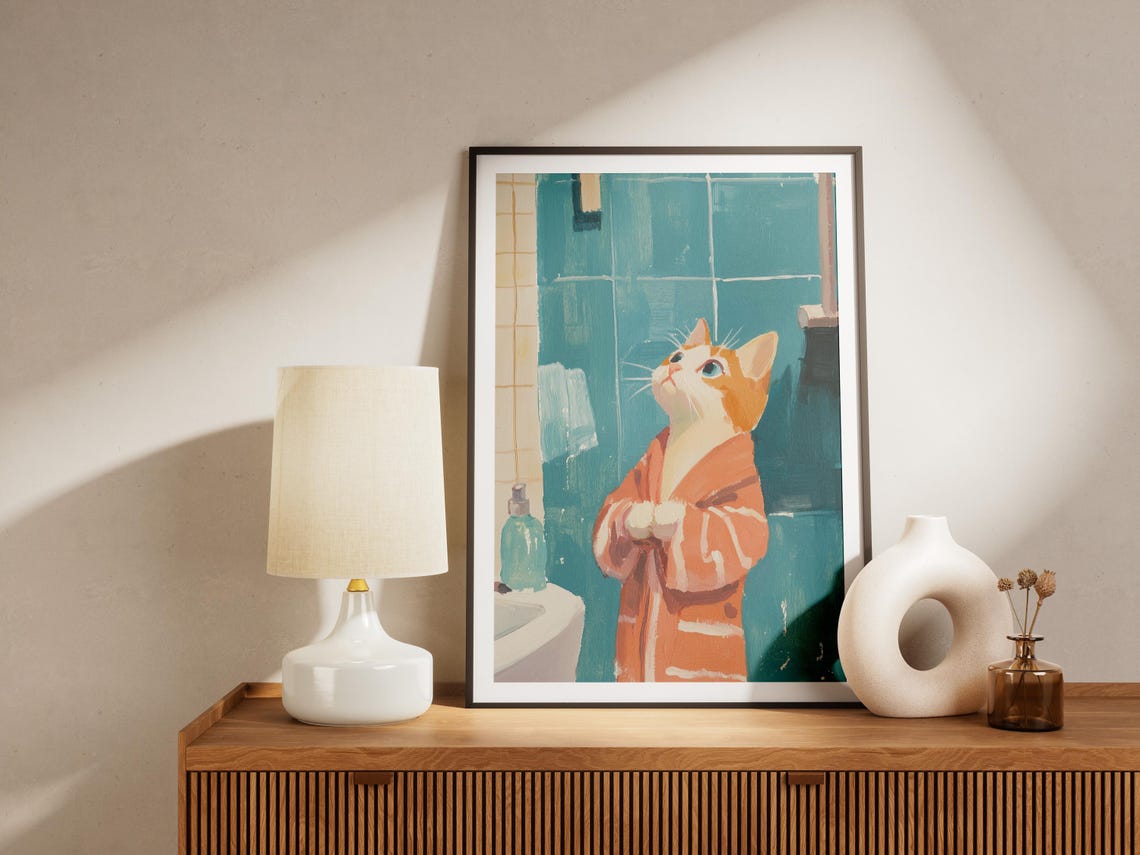 Kitten in an Orange Bathrobe Looking Up Cute Bathroom Poster - Image 4
