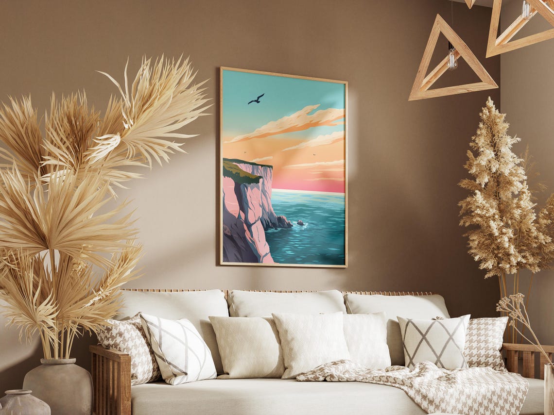 Pale Pink Cliffs Overlooking a Bright Turquoise Sea at Sunset Poster - Image 3