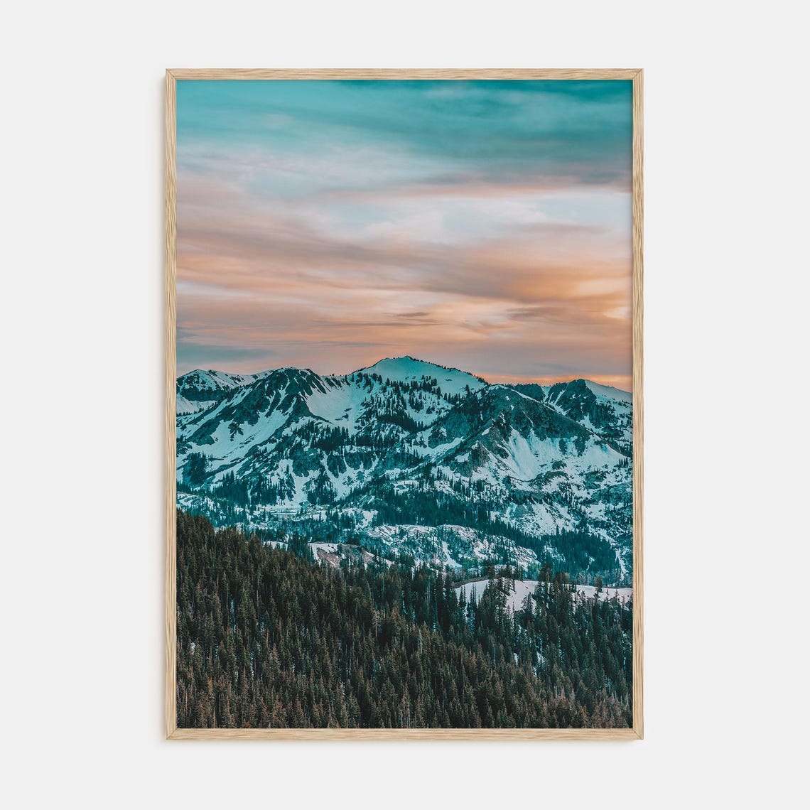 Snowy Mountain Range Glowing Under a Pink and Teal Sunset Poster