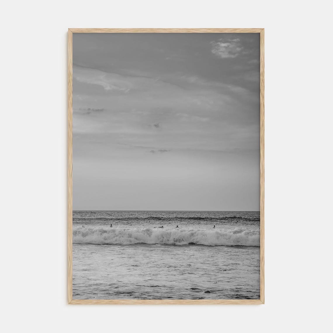Black and White Ocean Wave with Distant Surfers Seascape Poster