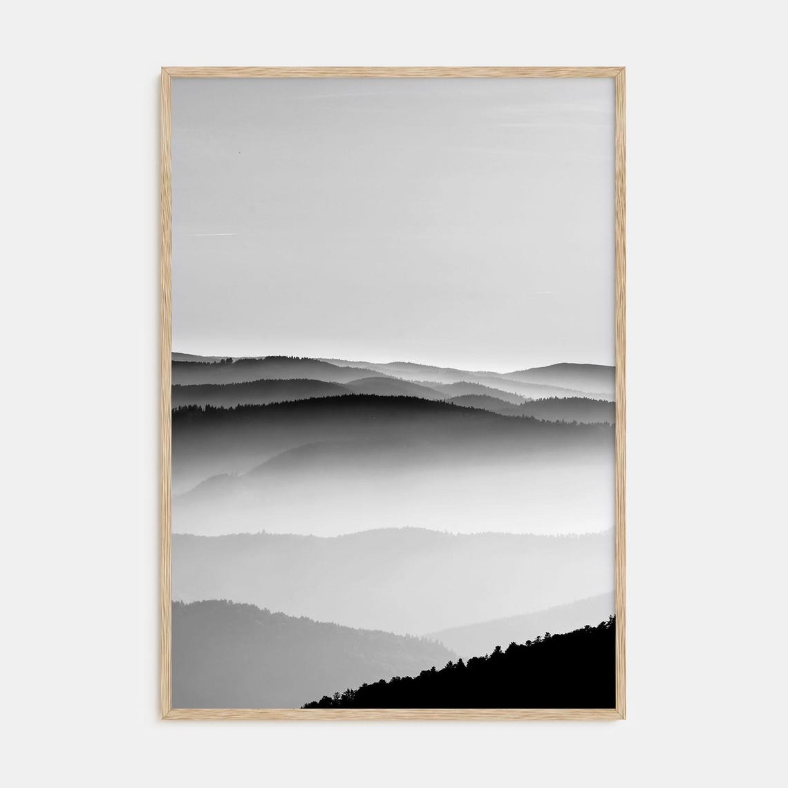 Black and White Photograph of Misty Mountain Ridges at Dawn Poster