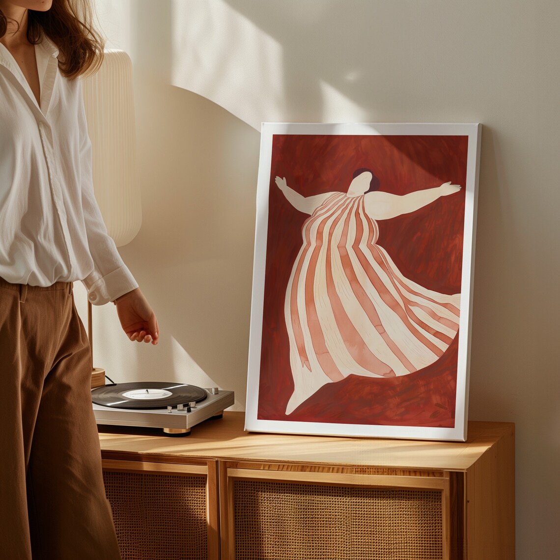 Joyful Curvy Woman Dancing In Striped Dress On Deep Red Wall Art - Image 2