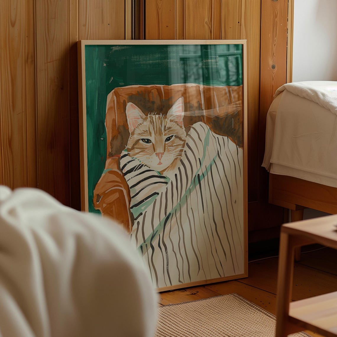 Cozy Tabby Cat Sleeping Under Striped Blanket Armchair Poster