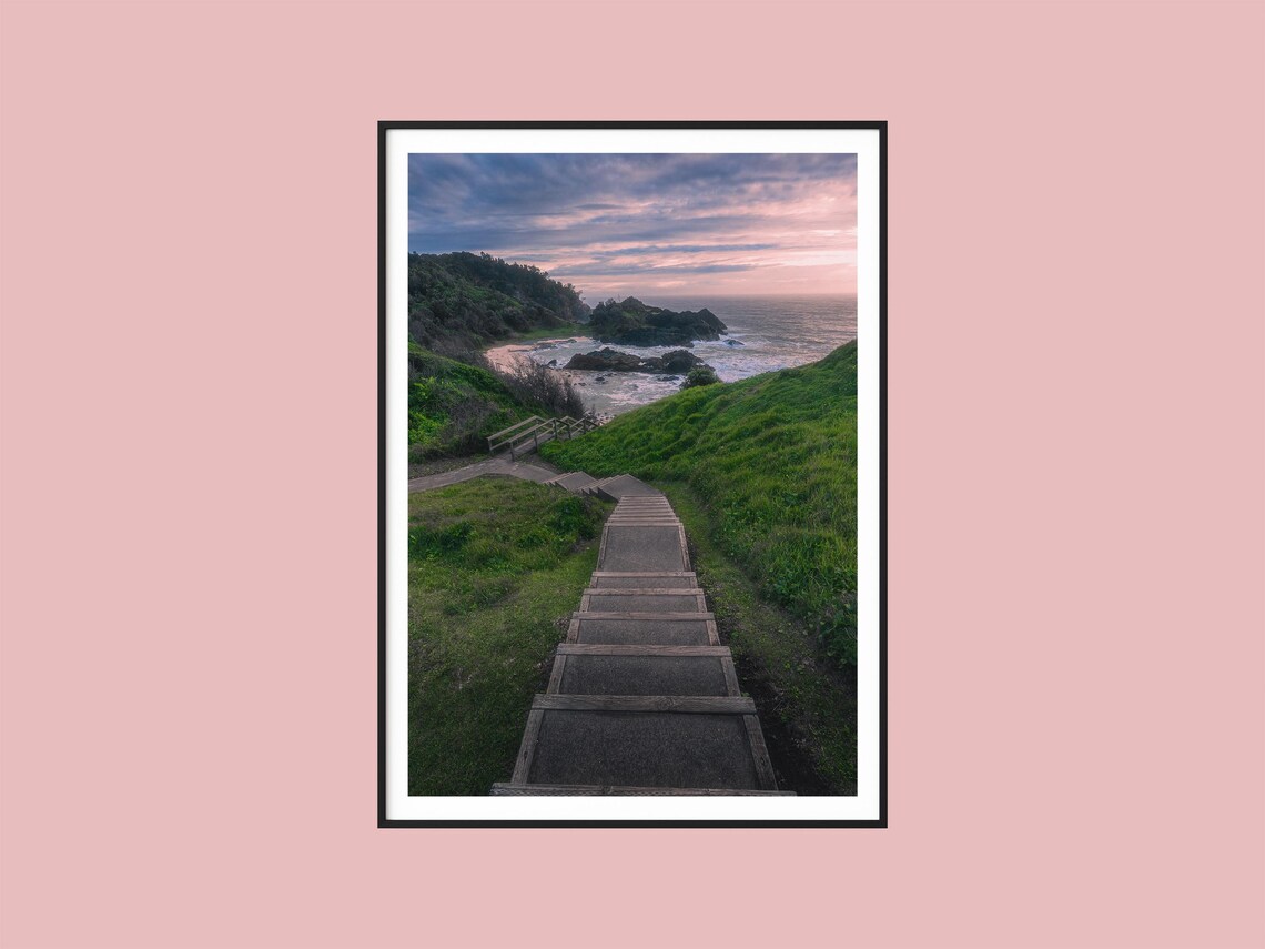 Wooden Steps Winding Down Through Hills to the Ocean Sunset Print