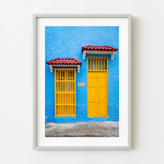 Bright Blue Colonial Facade with Yellow Doors Architecture Photo Poster