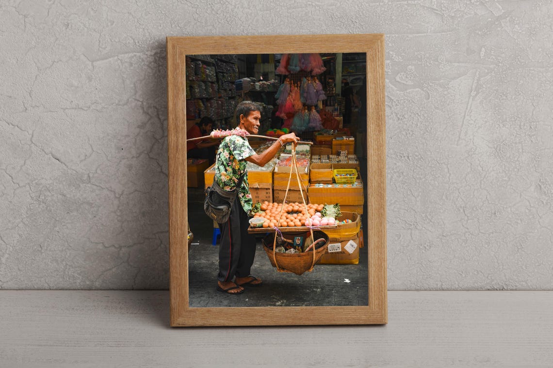 Street Vendor Carrying Egg Baskets on a Shoulder Pole Market Poster