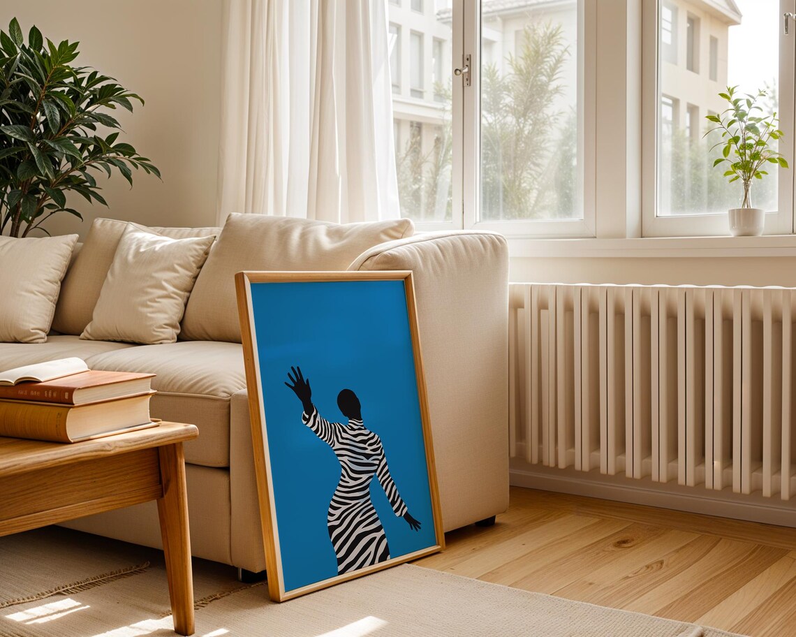 Stylish Woman In Zebra Striped Dress Against Bright Blue Poster - Image 3