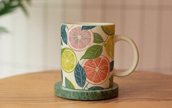 Colorful Citrus Fruit Slice Pattern on a Ceramic Mug Design Poster