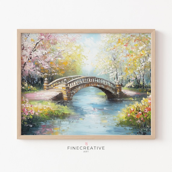 Arched Stone Bridge Over a River With Spring Blossom Trees Poster