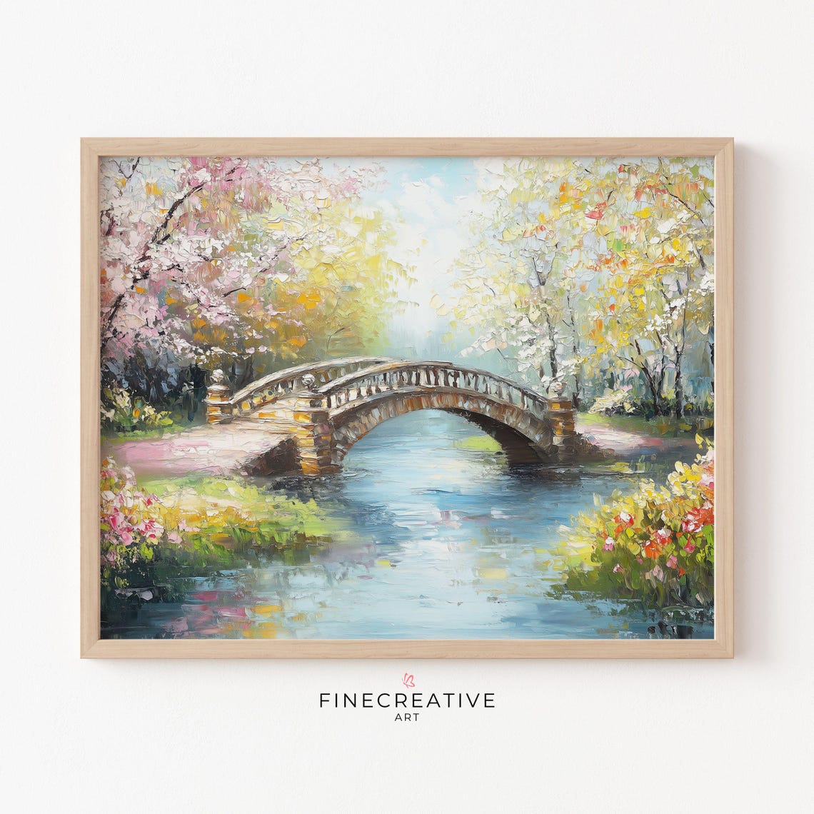 Arched Stone Bridge Over a River With Spring Blossom Trees Poster