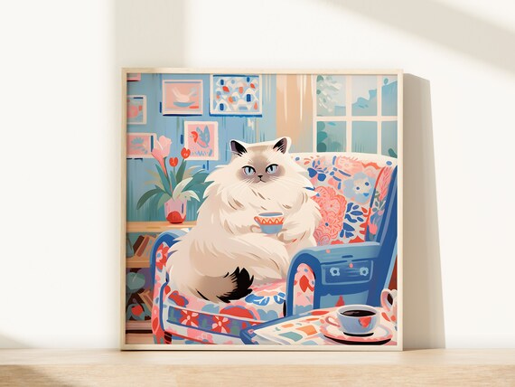 Sweet Ragdoll Cat with Teacup on Floral Sofa in Blue Room Poster