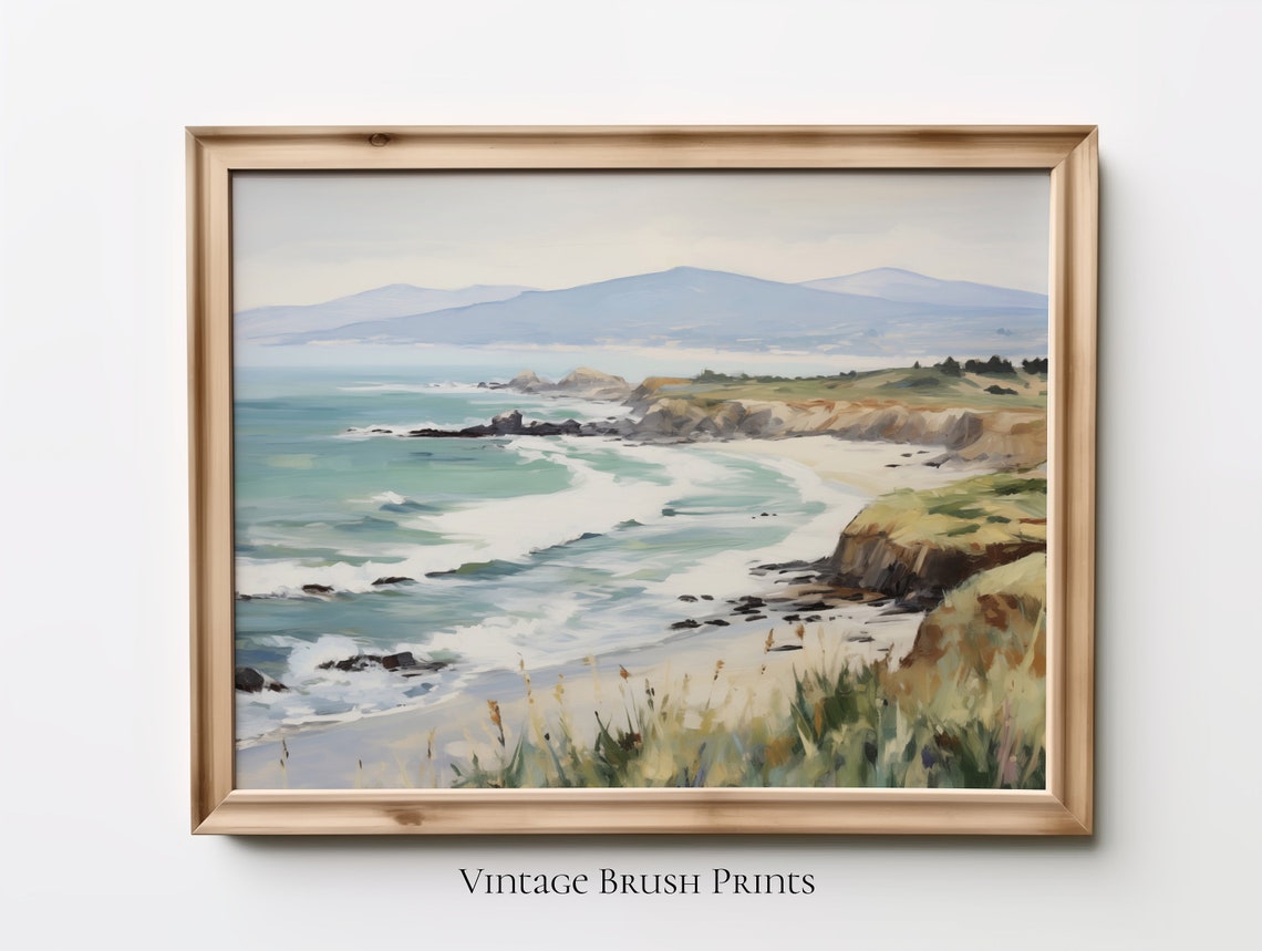 Rocky Coastal Seascape With Waves Cliffs and Distant Mountains Poster